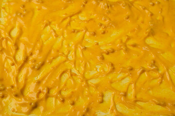 Yellow sauce splashes as a background.