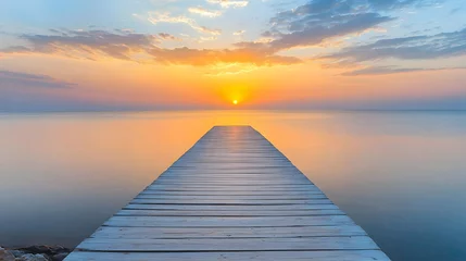 Fototapeten A minimalist wooden boardwalk stretching into a calm sea under a vibrant sunrise © afrah