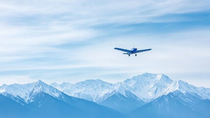 Naklejka premium Airplane flying over snow-capped mountains aerial view nature scene serene environment adventure concept