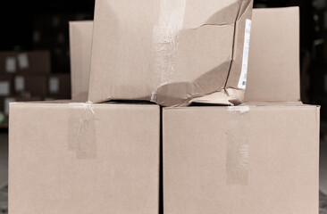 The packing box on the pallet with the goods is torn
