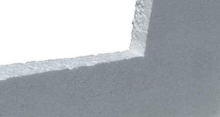 A piece of chopped white polystyrene