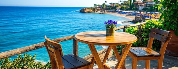 Fototapeta premium Coastal towns with cozy beachside cafes, small wooden tables overlooking the endless sea, perfect lighting and detail.