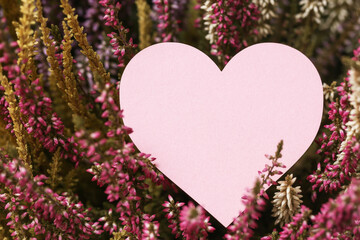 Lavender love background. Heart shape design created by blooming lavender flowers. Romantic and serene atmosphere. Valentine's Day symbol. Celebrating love and nature's beauty. Empty copy space.