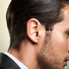Obraz premium handsome man, detail of right ear, AI generated