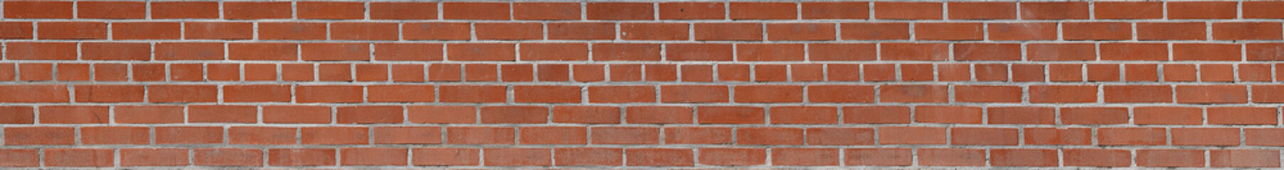 Panorámica de Pared de Ladrillos y Adoquines Rojos: Textura Urbana Auténtica con Cemento Gris, Resaltando el Encanto Industrial y la Historia de una Fábrica Abandonada con Alto Detalle y Definición