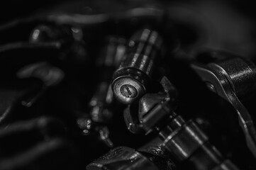 Close-up view of industrial metal gears in motion, symbolizing engineering, machine building,...