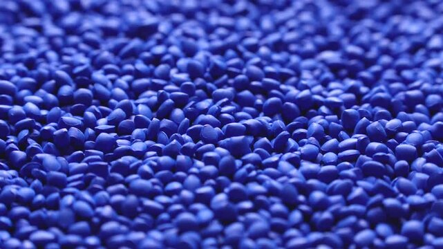 Blue polymer dye in granules, background texture