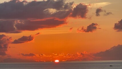 Vivid Sunrise with Sun Barely Peaking Over Horizon