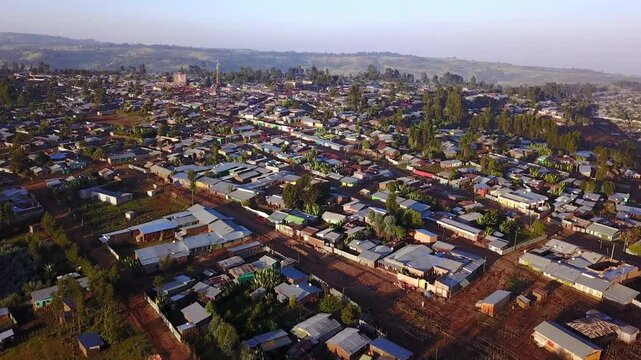Aerial rising shot flying over the city of Jeldu Gojo in the remote mountains of Ethiopia.