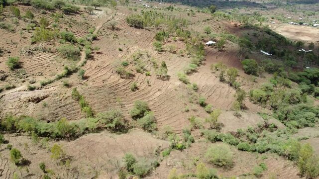 Aerial shot of the terraced hillsides of Konso, Ethiopia. The area is a UNESCO site for the ancient terraces that make farming possible in this arid area of Africa.