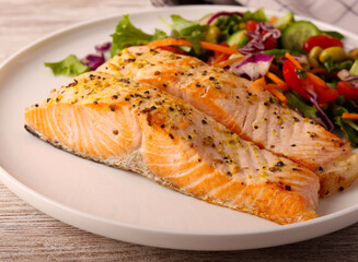 salmon fillet with salad