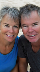 Happy Senior Couple Smiling Outdoors on a Beach Day