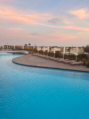 Beautiful Golden Sunset over Luxury Pool 