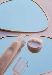 Eye Cream on a mirror tray. Eye Face Anti Wrinkles  Cream