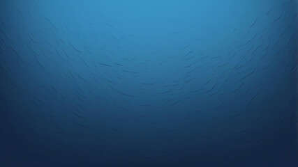 Obraz premium The image is a gradient of blue, starting with a lighter blue at the bottom and transitioning to a darker blue at the top. The texture is grainy, giving the impression of a textured surface. 