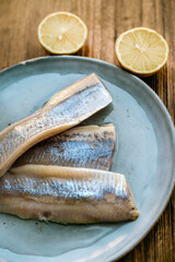 Marinated salted herring fillet in oil