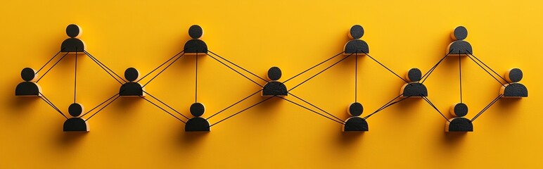 People icons on wooden blocks are joined by lines to illustrate business connections on a yellow backdrop