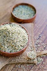 Hemp seeds in a wooden bowl 