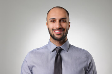 Portrait of businessman on light gray background