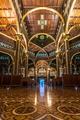 Interior hallway with columns and details of the dome of the Basilica of Our Lady of the Angels in Cartago, Costa Rica