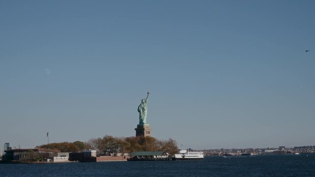Statue of Liberty Stands Majestically Against Beautifully Clear, Blue Sky Above