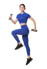 Fototapeta premium Woman in sportswear exercising with dumbbells on white background