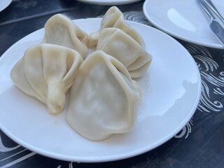 Traditional georgian khinkali in one of Tbilisi restaurants 