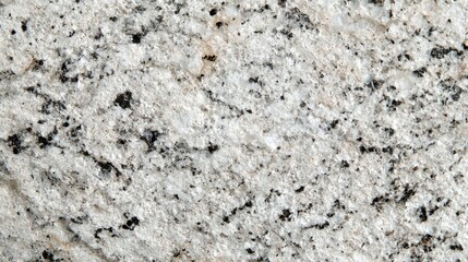 Close-Up View of a Textured Granite Surface with Black Specks