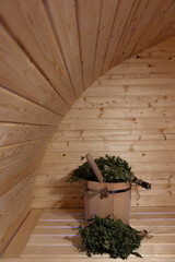 Russian wooden bathhouse , wooden bucket with a broom