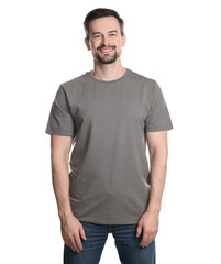 Fototapeta premium Man in blank grey t-shirt on white background. Mockup for design