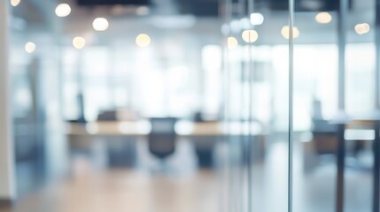 blurred office interior, glass partition, bokeh lights, modern workspace, out of focus background, corporate environment, soft lighting, minimalist design, clean aesthetic, professional setting, refle