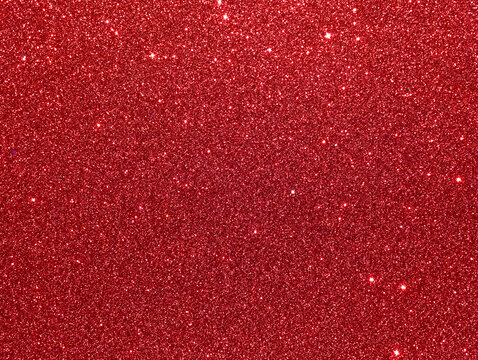Red sparkle background. Red glitter background. Red glimmer. Abstract twinkle texture. Glitter surface. Glimmer layout. Holiday layout. Diamond luxury surface. Celebration background. Holiday backdrop