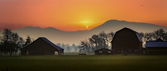 Two barns and Mary's peak silhouetted at sunset, near Corvallis Oregon © Bob