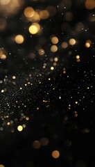 Obraz premium Shimmering golden particles on a dark background. Perfect for luxury, festive, or elegant designs.