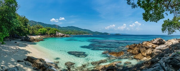 Fototapeta premium Panoramic view of the Blue Lagoon in Phuket, Thailand, with tropical greenery and rock formations in the background. High-resolution photography