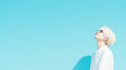 Man Gazing at Clear Blue Sky