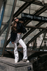 Fashion Caught Perfectly at the Subway Entrance Amid the Lively Streets of NYC