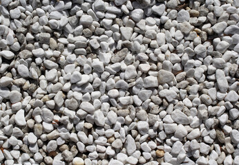 Group of white pebbles stones rocks abstract textured background
