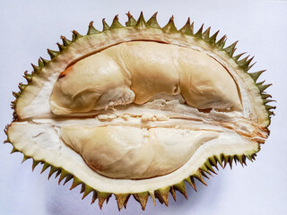 Ripe durian and tasty durian that has been peeled. Peeled durian fruit. Freshly harvested durian...