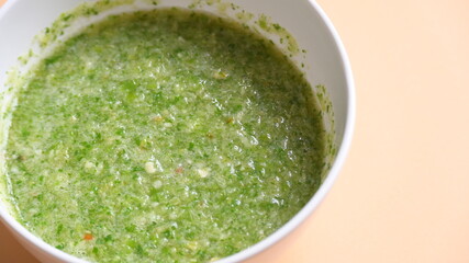 Thai spicy seafood dipping sauce on white bowl