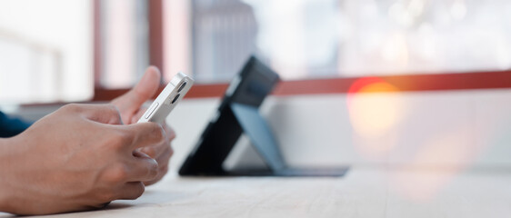 Social media and digital online concept, man using smart phone. The concept of living on vacation and playing social media. Social Distancing ,Working From Home