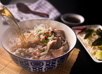 Steaming Bowl of Pho Noodles – Comforting Asian Cuisine