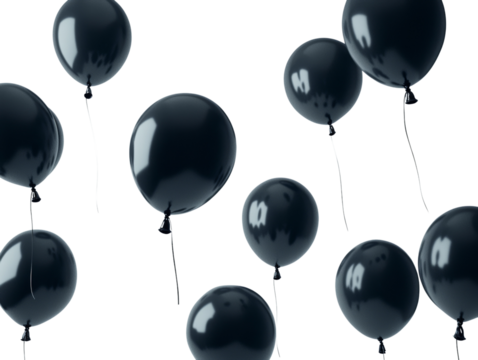 Black balloons floating in the air gracefully.