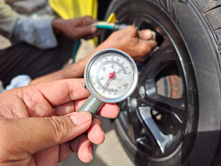 tire pressure gauge. measure air pressure safety