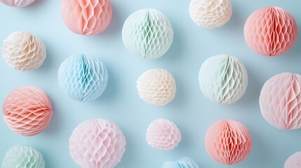 Pastel Paper Honeycomb Balls Arranged on Blue Background
