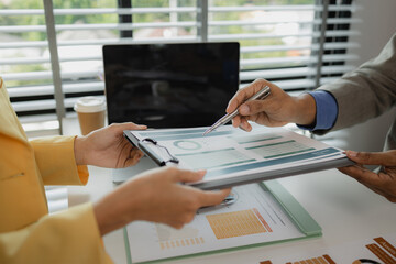 two busy professional executive team business people working together on business finances analysis at office meeting, professional manager consulting corporate client