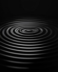 Black water ripples creating calming patterns.