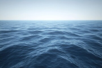 Calm ocean waves under a clear blue sky.