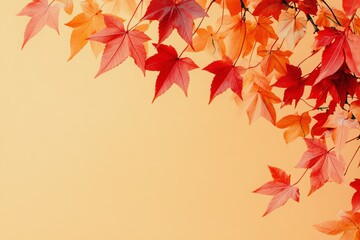Fototapeta premium Vibrant autumn leaves on warm background