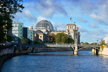 Reichstag Dome Spree River Berlin. The Reichstag and it’s glass dome from the banks of the Spree River in Berlin, Germany.   © maxdigi
